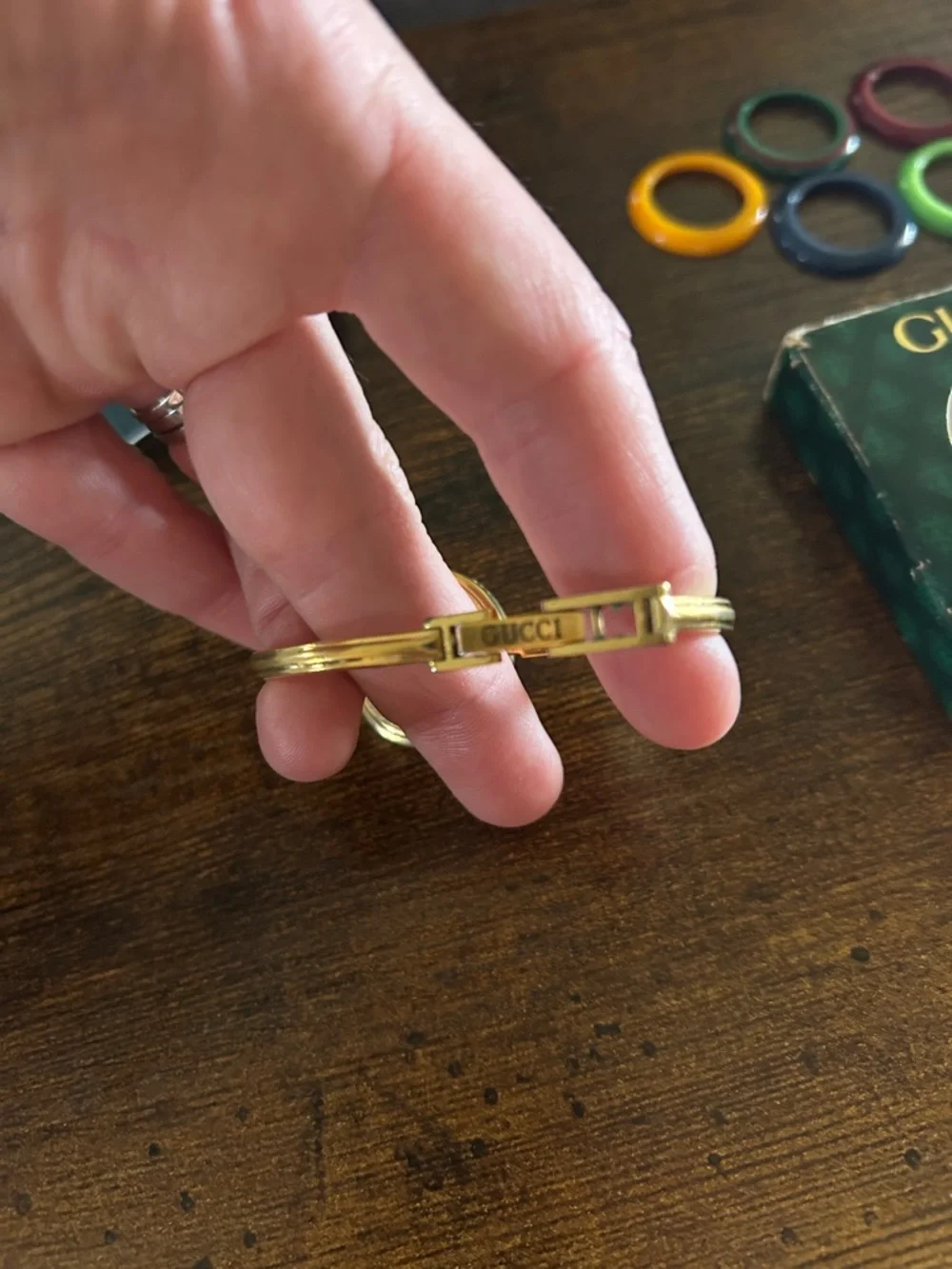 Gucci Gold Bangle Watch with Assorted Colored Interchangeable Bezels